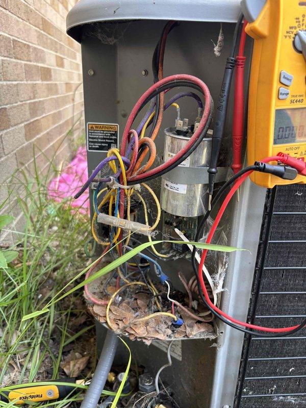 # CP-Cooling Problem

Responded to no-cooling complaint on 20-year-old air conditioning system. Upon inspection, found heavily corroded contactor and deteriorated electrical connections in outdoor condenser unit preventing compressor operation. Performed electrical diagnostics with multimeter to verify component failure. Replaced failed contactor, cleaned corroded wire terminals, and restored proper electrical connections. System tested and verified cooling operation with thermostat responding appropriately at 81°F indoor temperature.