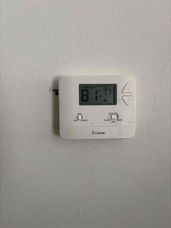 # CP-Cooling Problem

Responded to no-cooling complaint on 20-year-old air conditioning system. Upon inspection, found heavily corroded contactor and deteriorated electrical connections in outdoor condenser unit preventing compressor operation. Performed electrical diagnostics with multimeter to verify component failure. Replaced failed contactor, cleaned corroded wire terminals, and restored proper electrical connections. System tested and verified cooling operation with thermostat responding appropriately at 81°F indoor temperature.