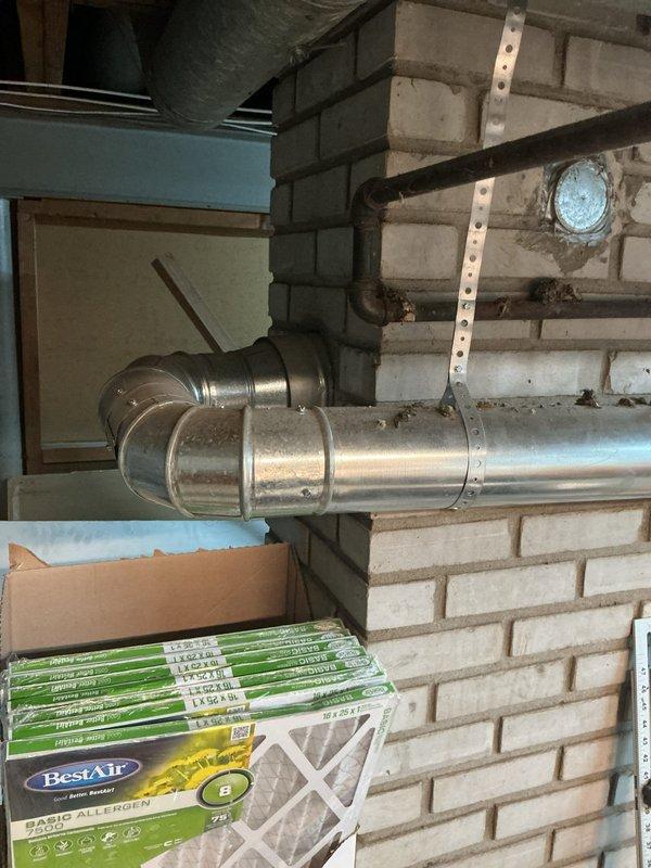 Completed annual cooling maintenance on 2017 EnergiAir system with warranty valid through August 2028. Performed comprehensive tune-up including system inspection, filter assessment, and documentation of equipment condition. All components operating within normal parameters; photographed HVAC ductwork installation, available replacement filters, and mechanical room layout for service records.