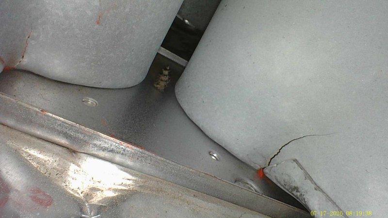 Completed annual cooling maintenance on 27-year-old Goodman air conditioning system. Performed comprehensive tune-up inspection including ductwork assessment, verified system connections and securing clamps, and documented equipment condition with photos showing normal wear consistent with system age.