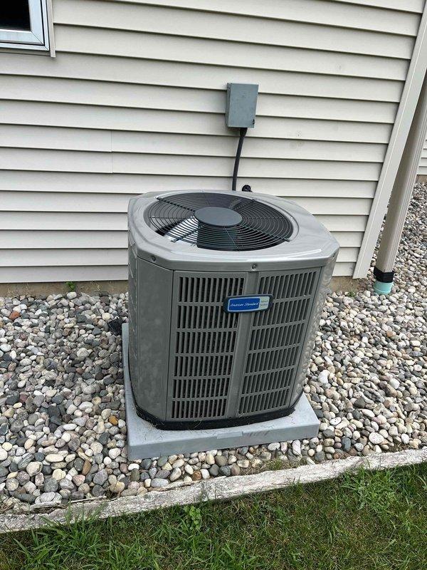 Completed annual cooling maintenance on American Standard residential HVAC system. Performed comprehensive inspection of outdoor condenser unit and indoor Luxaire furnace components, verified proper operation of all mechanical systems, checked refrigerant levels, inspected electrical connections and disconnect box, examined ductwork and copper line sets for integrity, and confirmed system is operating within manufacturer specifications for the upcoming cooling season.