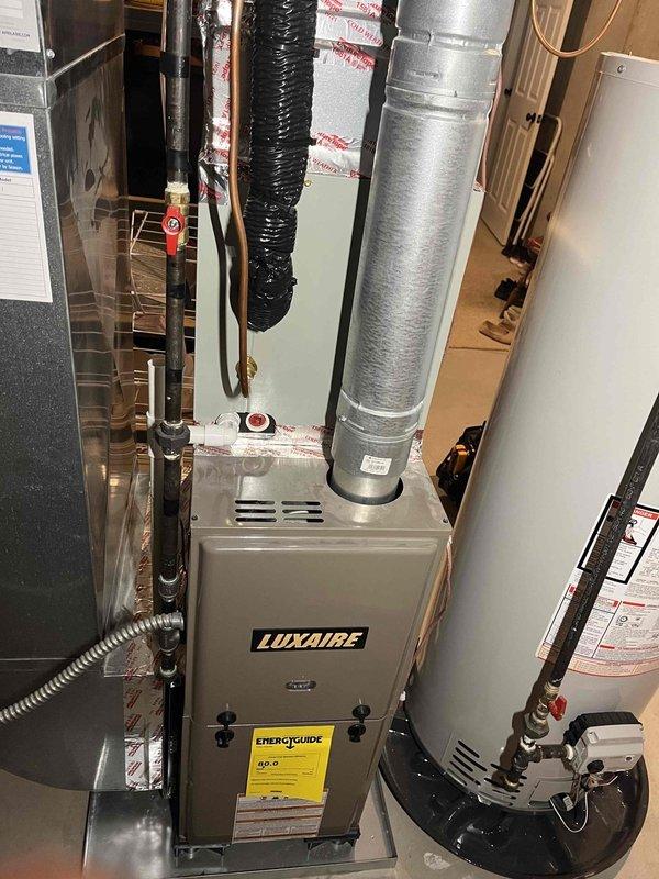Completed annual cooling maintenance on American Standard residential HVAC system. Performed comprehensive inspection of outdoor condenser unit and indoor Luxaire furnace components, verified proper operation of all mechanical systems, checked refrigerant levels, inspected electrical connections and disconnect box, examined ductwork and copper line sets for integrity, and confirmed system is operating within manufacturer specifications for the upcoming cooling season.