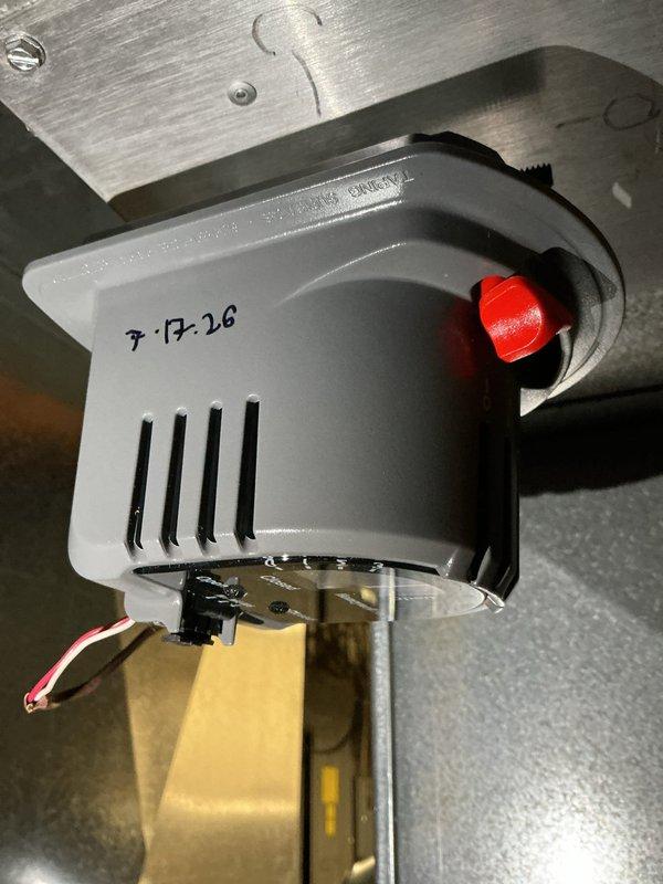 Responded to service call for two-zone air conditioning system with one zone not functioning properly. Upon arrival, inspected 25-year-old system that had been previously upgraded with Honeywell Home HZ311 zone control panel. Evaluated zone damper operation and control wiring connections at equipment location. Examined zone damper actuator motor with red adjustment dial, verified proper mounting and mechanical operation. Tested zone control panel functionality, confirmed digital display and zone indicator lights operational. Checked damper motor positioning and response to thermostat calls. Verified Aprilaire humidifier controller settings and operation as part of overall system assessment. Inspected all visible wiring connections between zone control panel and damper actuators. System evaluation completed with photographic documentation of control equipment and damper actuator installation for service records.