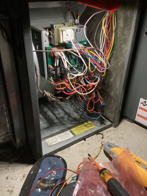 Responded to no cooling call on 14-year-old GDM system affecting entire property. Upon arrival, performed diagnostic evaluation of outdoor condenser unit and indoor control panel. Inspected electrical components, control board, transformer, and wiring connections within HVAC control cabinet. Assessed outdoor condensing unit condition, noting normal wear consistent with age and outdoor exposure. Documented system configuration and component conditions with photos for service records. System was evaluated and appropriate recommendations provided to restore cooling operation.