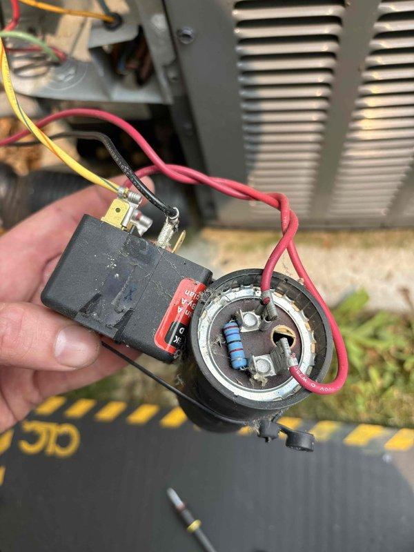 Responded to no-start condition on EnergiAir air conditioning unit where condenser fan motor failed to operate consistently, requiring manual percussion to initiate operation. Diagnosed failed start/run capacitor through visual inspection and electrical testing. Replaced defective dual capacitor and verified proper wire connections to compressor and condenser fan motor terminals. System tested successfully with multiple cooling cycles, confirming reliable fan motor startup and normal compressor operation.