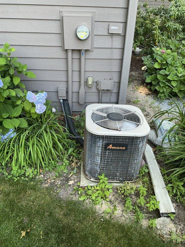 Completed estimate for furnace and air conditioning system replacement. Evaluated existing Amana outdoor condensing unit showing age-related wear and diminished cooling performance. Assessed attic-mounted air handler and ductwork system, noting flexible duct connections and equipment configuration. Provided replacement options and recommendations for complete HVAC system upgrade.