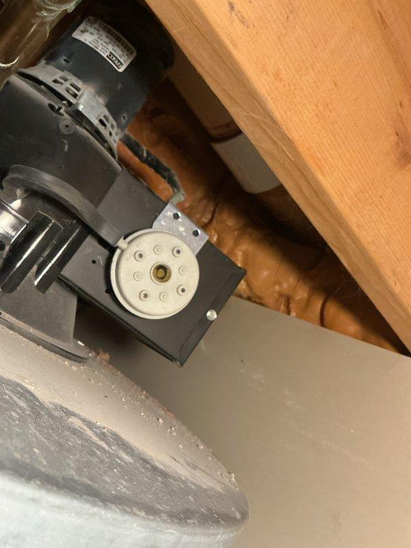 Responded to emergency call for 15-year-old atmospheric vent water heater with suspected venting failure after gas detection alarm and unusual odors near unit. Upon inspection, found draft hood inducer motor had failed, preventing proper exhaust of combustion gases from water heater cabinet. Verified inadequate draft using combustion analyzer and visual smoke test at draft hood connection. Replaced failed inducer motor assembly and verified proper venting operation with draft pressure measurements and combustion safety testing. Confirmed no carbon monoxide present in living space and all combustion byproducts exhausting properly through existing vent system. Unit restored to safe operating condition with proper draft established.
