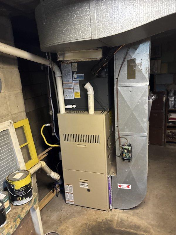 Successfully completed installation of add-on air conditioning system to existing forced-air heating infrastructure. Integrated new AC evaporator coil with existing furnace unit in basement mechanical room, including proper refrigerant line connections and condensate drainage routing via PVC piping. Installed outdoor condensing unit on concrete pad with appropriate clearances, secured electrical connections, and completed refrigerant charging to manufacturer specifications. Verified proper airflow through existing ductwork, tested system operation through complete cooling cycle, and confirmed thermostat communication with new equipment. System commissioned and left in fully operational condition with all components functioning within normal parameters.