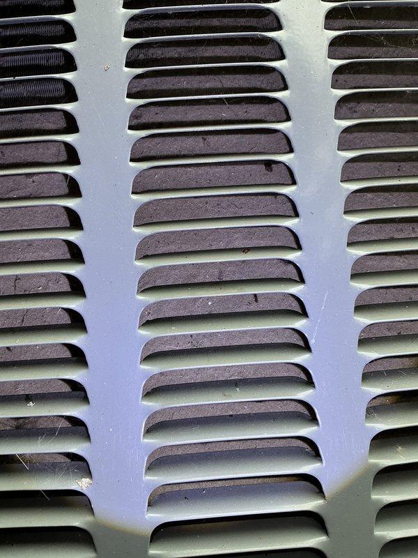 Completed annual cooling maintenance on 2015 EnergiAir system under 5-year warranty agreement. Performed comprehensive AC tune-up including inspection of air handler cabinet interior, verified proper operation of A/C Ease condensate treatment system, checked PVC drainage lines and refrigerant line connections with proper securing of flexible hoses and zip ties. Inspected exterior ventilation louvers and grills, noting normal wear consistent with age and outdoor exposure. All components operating within manufacturer specifications, system ready for cooling season.