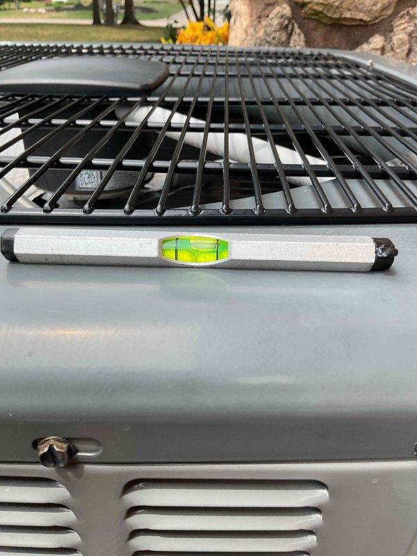 Completed annual cooling maintenance on 2016 EnergiAir system under 4-year warranty agreement. Performed comprehensive AC tune-up including system inspection, verified unit levelness, checked all operational parameters, and documented equipment condition with photos. Unit operating within manufacturer specifications with no issues found.
