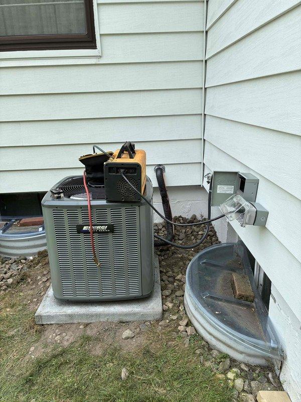 Completed add-on air conditioning installation with 100-amp electrical service upgrade. Coordinated utility disconnect/reconnect and obtained electrical permit PE26-0849, with all work passing inspection. Installed new outdoor condensing unit on concrete pad, ran refrigerant lines, upgraded electrical service panel with new breaker boxes and conduit, and restored power upon completion of inspection.