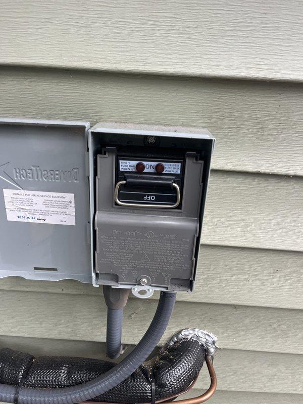 Responded to failed inspection due to code violation regarding incorrect amperage breaker installation. Replaced 30-amp breaker with proper 20-amp fuses to match maximum amp capacity specifications for HVAC disconnect. Verified correct NR 20A time-delay fuses were installed in exterior disconnect box and confirmed system operation following correction.