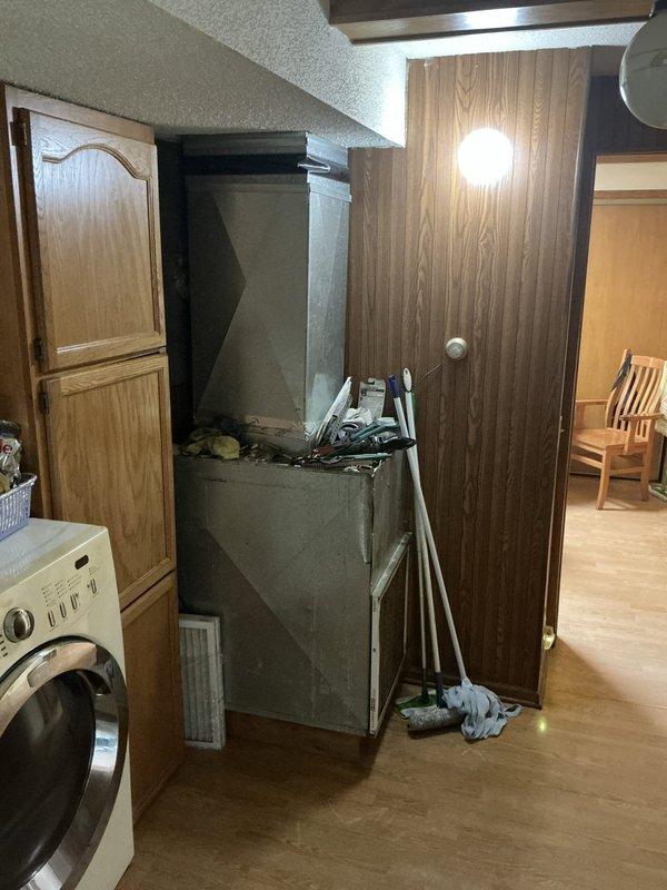Completed estimate for furnace and air conditioning installation at residential property with existing ductwork in both attic and basement. Property currently has disconnected propane backup system and wood boiler furnace that requires removal and disconnection. Assessment included evaluation of existing electrical panel, utility space configuration, and current HVAC infrastructure to provide recommendations for new furnace installation and AC system addition.