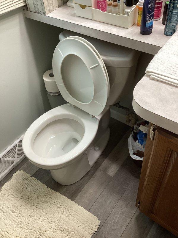 Responded to service call for toilet making coughing noise and leaking sink. Upon inspection, identified issues with toilet fill valve causing air in the water line and addressed leak at kitchen sink drain connections beneath the cabinet. Inspected garbage disposal unit and associated plumbing connections, tightened loose fittings, and verified proper drainage. Tested toilet flush cycle and sink drainage to confirm all issues resolved and systems operating properly.