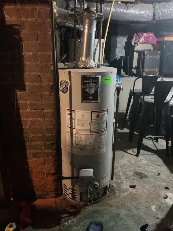 Responded to no-ignition complaint on residential water heater. Upon inspection, found unit experiencing ignition failure. Removed and inspected burner assembly, identifying corroded thermocouple and debris accumulation in pilot assembly preventing proper flame sensing. Cleaned burner orifice, pilot assembly, and flame sensor. Replaced failed thermocouple and tested gas valve operation. Verified proper venting and combustion air supply. Cycled unit multiple times, confirmed reliable ignition, and verified temperature rise. Unit restored to normal operation with proper pilot flame and main burner ignition sequence.
