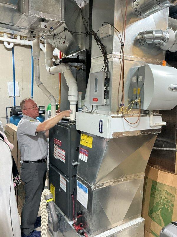 Completed annual cooling system maintenance on 15-year-old Goodman AC unit. Performed comprehensive tune-up including inspection of air handler, ductwork assembly, refrigerant lines, electrical connections, and condensate drainage system. All components inspected and found operating within normal parameters; system ready for cooling season.