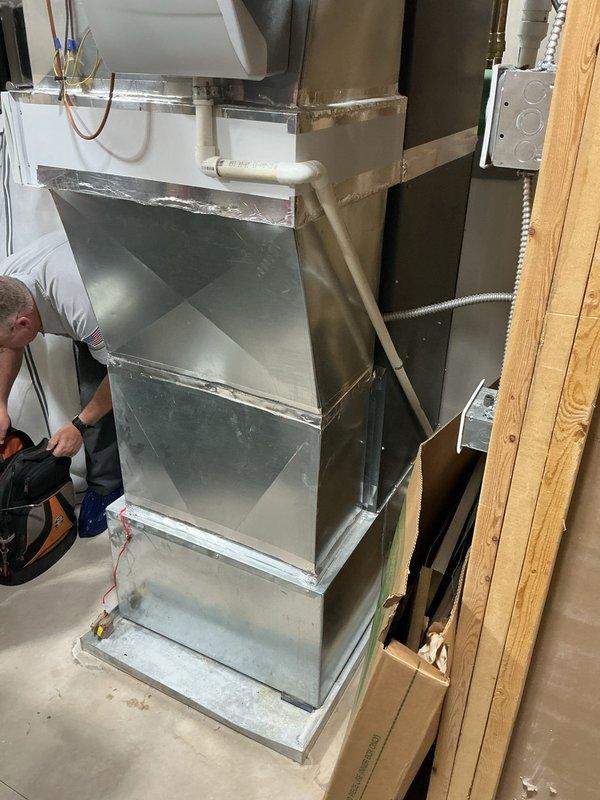 Completed annual cooling system maintenance on 15-year-old Goodman AC unit. Performed comprehensive tune-up including inspection of air handler, ductwork assembly, refrigerant lines, electrical connections, and condensate drainage system. All components inspected and found operating within normal parameters; system ready for cooling season.