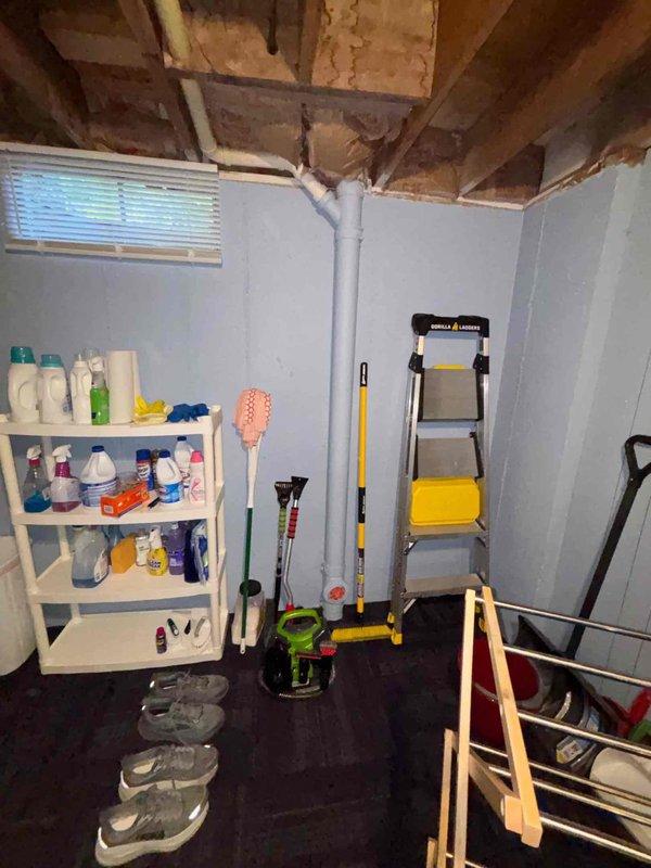 Completed return visit for ongoing water leak investigation originating from upstairs shower. Documented existing conditions in basement area showing exposed ceiling joists where previous remediation work had been performed. Photographed affected areas including visible plumbing lines and structural components awaiting final repairs from upper-level shower source. Client advised that remediation phase is complete and repair work from upstairs unit is pending.