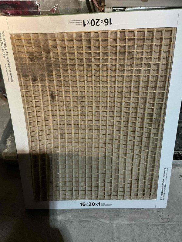 Responded to no cooling complaint on 6-year-old Bryant AC system affecting entire house. Upon inspection, found severely clogged air filter restricting airflow, which caused the evaporator coil to freeze and prevented proper cooling operation. Replaced dirty filter with new 16x20x1 filter, allowed frozen coil to thaw, and restored system to normal cooling operation.