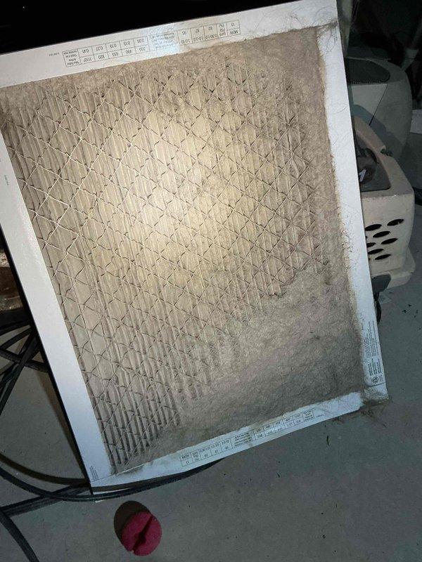 Responded to no cooling complaint on 6-year-old Bryant AC system affecting entire house. Upon inspection, found severely clogged air filter restricting airflow, which caused the evaporator coil to freeze and prevented proper cooling operation. Replaced dirty filter with new 16x20x1 filter, allowed frozen coil to thaw, and restored system to normal cooling operation.