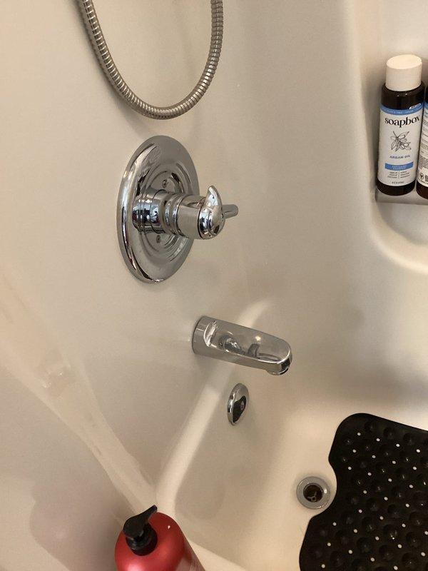 Responded to multiple plumbing leak concerns throughout the residence. Inspected double vanity bathroom sink for steady leak and assessed repair requirements. Examined upstairs bathroom shower temperature control knob that had detached from valve stem, determined adhesive repair and replacement necessary. Investigated toilet tank components for minor leak, identified worn flapper and internal mechanisms contributing to water seepage. Evaluated garage sink location for potential spigot installation to add water access point. Assessed laundry room sink faucet requiring complete replacement due to deterioration and malfunction. Documented existing conditions of shower fixtures and toilet tank internal components including fill valve assembly, flush mechanism, and float ball system showing mineral deposits and age-related wear. Provided comprehensive evaluation of all reported leak sources and additional plumbing upgrade requests for property.