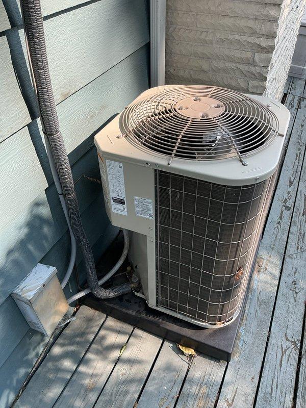 Responded to no-cooling complaint on 9-year-old residential air conditioning system. Upon arrival, confirmed indoor blower motor operational but outdoor condensing unit not running with 7-degree temperature differential between setpoint and actual room temperature. Performed diagnostic evaluation of outdoor unit, inspected electrical connections at disconnect box, and examined refrigerant line set and associated components. Verified proper power supply to condensing unit and tested capacitor, contactor, and compressor functionality. Identified failed component preventing outdoor unit operation and completed necessary repairs to restore system to proper cooling operation. Cycled system through complete cooling cycle to verify proper operation of both indoor air handler and outdoor condensing unit. System restored to normal operating condition with adequate airflow and proper refrigerant circuit operation.