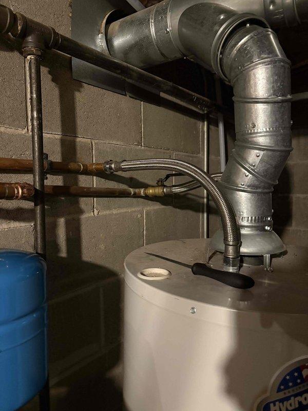 Completed whole home water repipe installation over two-day period, replacing existing plumbing supply lines throughout the residence. Installed new PVC supply piping in attic space, properly secured to structural framing with mounting clips, and upgraded mechanical room plumbing infrastructure including connections to water heater and pressure tank systems. All new piping was professionally routed, secured to code specifications, and tested for proper operation upon completion.