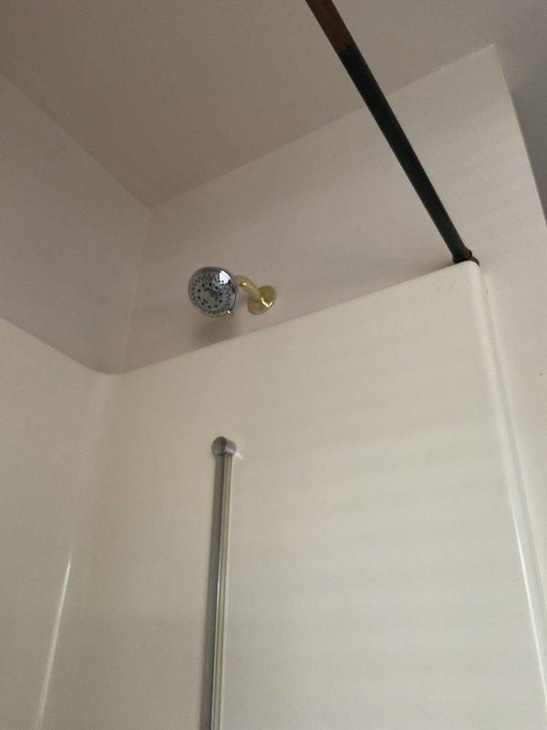 Provided project estimate for complete guest bathroom plumbing fixture replacement in a 1989-built home. Customer-supplied fixtures include new sink, tub/shower assembly, and associated hardware. Existing fixtures are functional with no active leaks but require replacement due to age. Documented current bathroom configuration including chrome showerhead, brass valve controls, and beige tub surfaces. Assessed installation requirements for proper fixture mounting, water supply connections, and drain assemblies. Estimate includes removal of existing fixtures, installation of new customer-provided sink and tub/shower components, and verification of all connections for proper operation and code compliance.