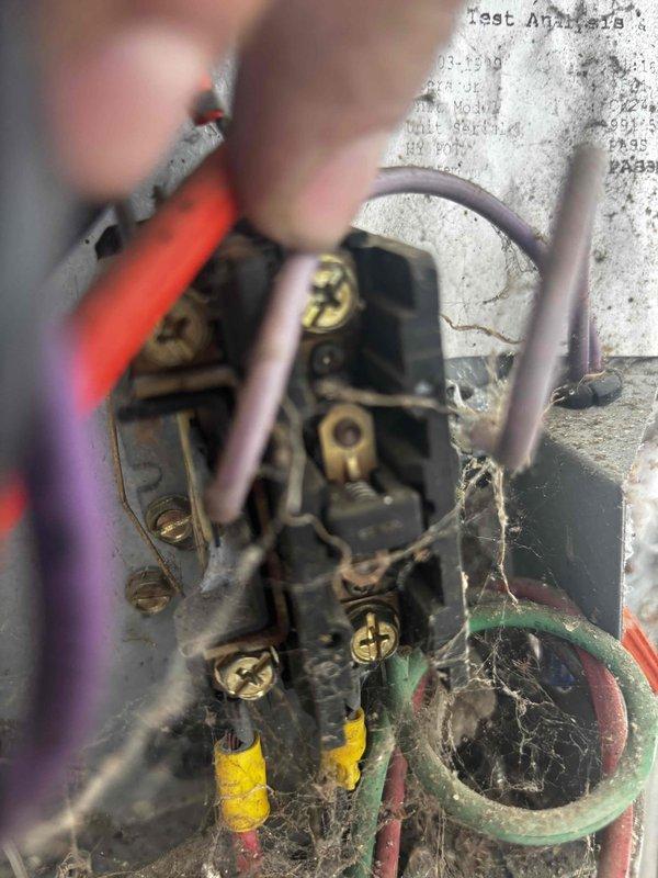 Completed comprehensive Super Tune-up on 16-year-old air conditioning system. Performed full system inspection including electrical connections at outdoor unit junction box, verified all wire terminations secure despite accumulated debris and weathering. Inspected internal mechanical components, copper refrigerant lines, and associated plumbing connections showing normal operational wear. Documented system condition with photos of exterior electrical junction and internal HVAC components for service records.
