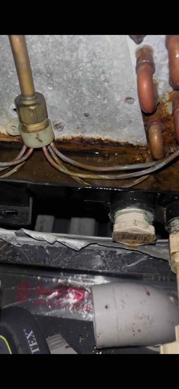 Completed comprehensive Super Tune-up on 16-year-old air conditioning system. Performed full system inspection including electrical connections at outdoor unit junction box, verified all wire terminations secure despite accumulated debris and weathering. Inspected internal mechanical components, copper refrigerant lines, and associated plumbing connections showing normal operational wear. Documented system condition with photos of exterior electrical junction and internal HVAC components for service records.