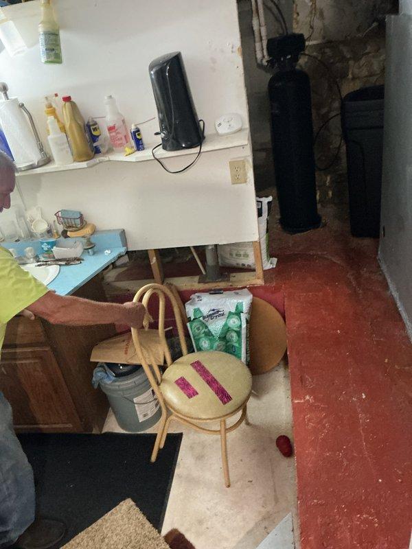 Responded to no cooling complaint at single-family residence with 25-30 year old air conditioning system. Upon arrival, confirmed compressor failure with complete loss of cooling throughout home. Inspected outdoor condensing unit and indoor components located in basement utility area. Found compressor motor inoperable with no electrical draw, indicating internal mechanical failure consistent with age of equipment. Evaluated electrical connections, capacitor, and contactor operation; confirmed power supply reaching unit but compressor not engaging. Given the advanced age of the system and extent of component deterioration observed in basement installation area, recommended full system replacement rather than compressor repair due to cost-effectiveness and reliability concerns. Documented equipment condition with photographs showing basement mechanical room layout and aged ductwork with visible corrosion. Provided customer with replacement options and explained benefits of upgrading to m