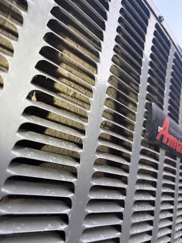 # NC-No Cool Service Completed

Responded to no cooling call with furnace blower and outdoor unit not operating. Upon arrival, performed system inspection and identified severely restricted airflow due to heavily contaminated air filter with excessive dust and debris accumulation. Filter showed extended period of use without replacement, blocking proper air circulation through the system.

Inspected outdoor condensing unit and found significant dirt and debris buildup on condenser coil fins and louvers, restricting heat transfer capability and airflow. The contamination was concentrated on the intake sections, preventing adequate ventilation required for proper system operation.

Replaced clogged air filter with new filter to restore proper airflow through the system. Cleaned outdoor condenser coil and louvers to remove accumulated dirt and debris, restoring heat rejection capacity. Verified both indoor blower and outdoor unit returned to normal operation with adequate airflow. System 