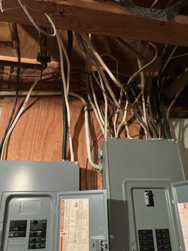 Conducted on-site assessment for whole-home generator installation at 47-year-old residence. Evaluated existing electrical infrastructure, including dual panel configuration mounted in unfinished basement area, noting current service capacity and available connection points for generator transfer switch integration. Documented utility space layout, water heater proximity, and potential routing paths for required electrical conduit and gas lines. Photographed electrical panels and mechanical room to determine optimal placement for automatic transfer switch and generator pad location. Provided detailed estimate for complete standby generator system installation including all necessary electrical upgrades and permits.
