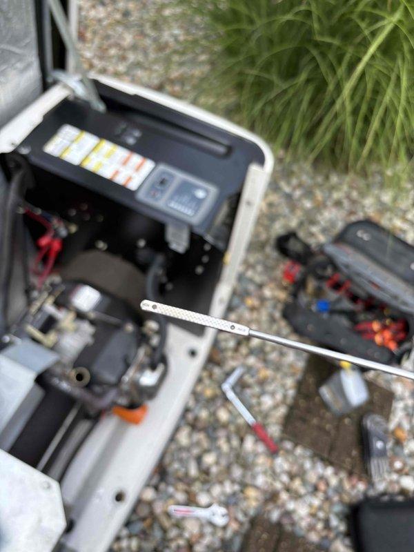 Completed preventative maintenance tune-up on Generac generator experiencing "RPM Sensor Loss" error code. Performed diagnostic testing with multimeter to verify sensor functionality and electrical connections, inspected all mechanical components including motor assembly and mounting hardware, and cleared error code after confirming proper sensor operation. Unit tested successfully and returned to normal operating parameters.