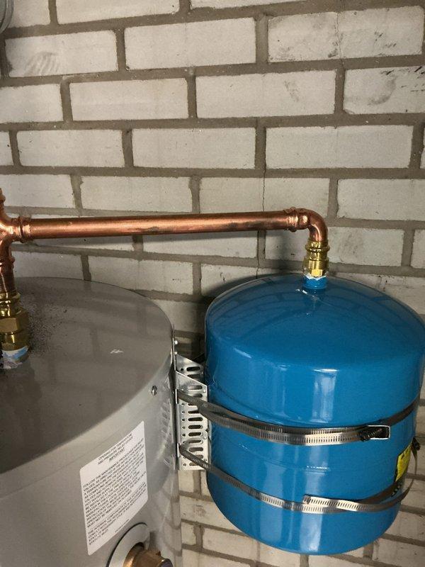 Performed main line snake and camera inspection to assess drain condition, followed by kitchen sink snaking to clear blockage. Replaced 40-gallon natural gas water heater with new unit, including installation of expansion tank and pressure relief valve. Secured and supported loose water lines throughout the system to ensure proper operation and code compliance.