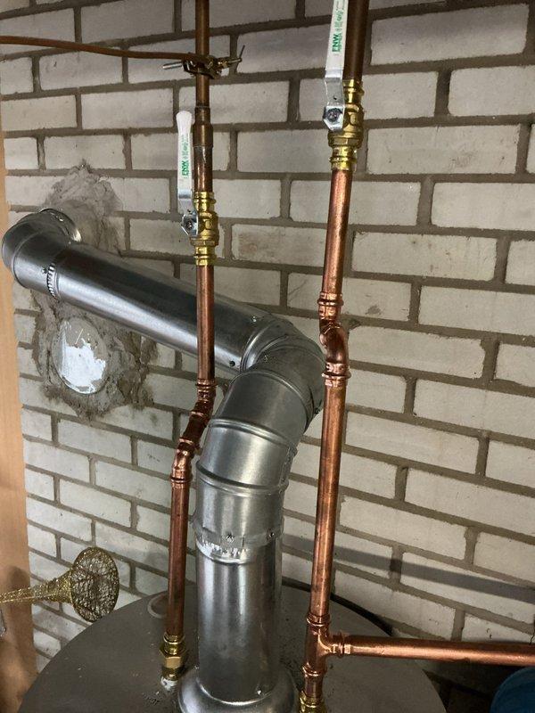 Performed main line snake and camera inspection to assess drain condition, followed by kitchen sink snaking to clear blockage. Replaced 40-gallon natural gas water heater with new unit, including installation of expansion tank and pressure relief valve. Secured and supported loose water lines throughout the system to ensure proper operation and code compliance.