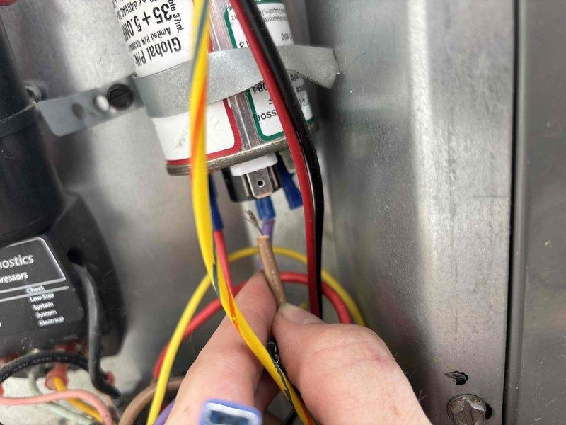 Completed annual cooling maintenance on 8-year-old EnergiAir system with warranty through July 2027. Inspected electrical components including contactors, capacitors, and CoreSense Air-Conditioned Boost Compressor module; checked all wire connections and tested system diagnostics with temperature probe to verify proper operation and cooling performance.