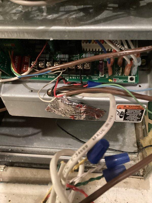 Responded to thermostat malfunction following previous day's AC installation. Verified wiring connections at both the thermostat and control board terminals, corrected improper wire terminations on the HVAC control board, and confirmed proper communication between thermostat and newly installed equipment. System tested successfully with all heating and cooling functions operating as designed.