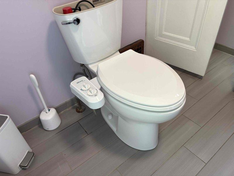 Responded to toilet continuously running due to failed flush valve seal. Removed tank lid, inspected internal components, and replaced faulty flush valve assembly to restore proper sealing and stop water waste. Verified proper operation and water shutoff after flush cycle completion.