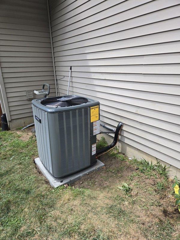 Completed full HVAC system installation including new furnace and air conditioning condenser unit. Installed outdoor AC unit on concrete pad at exterior corner location with proper clearances, secured refrigerant lines with mounting brackets along exterior wall, and ran electrical conduit to code. Connected and tested all refrigerant line sets, verified electrical connections, and ensured proper system operation. Unit positioned on level concrete foundation with adequate airflow access. All components installed per manufacturer specifications and industry standards. System startup completed successfully with all equipment functioning as designed.