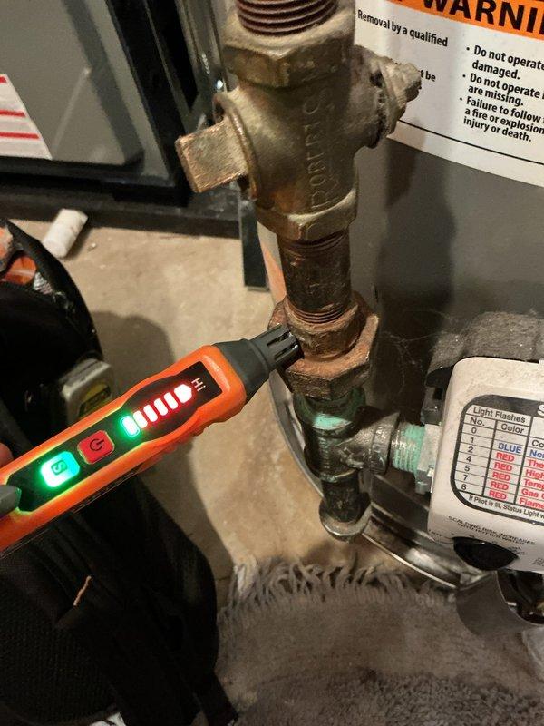 Completed annual cooling maintenance on 2011 EnergiAir WT 02-2035 system. Investigated reported noise from basement piping during operation and performed diagnostic testing on plumbing connections using electronic leak detection equipment, identifying significant corrosion and oxidation on brass pipe fittings and threaded connections. System tuned up and operational parameters verified within manufacturer specifications.