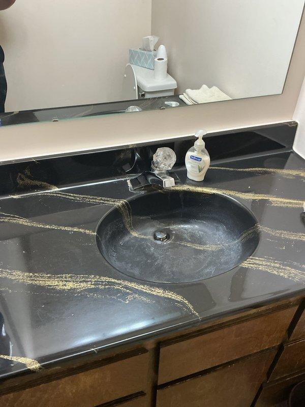 Responded to plumbing leak call for bathroom fixtures including toilets, faucets, and sinks. Inspected two bathroom vanities with integrated sinks and faucets for sources of water leakage. Examined plumbing connections, drain assemblies, and fixture mounting points to identify and address leak issues, ensuring proper function and water-tight seals throughout the bathroom plumbing system.