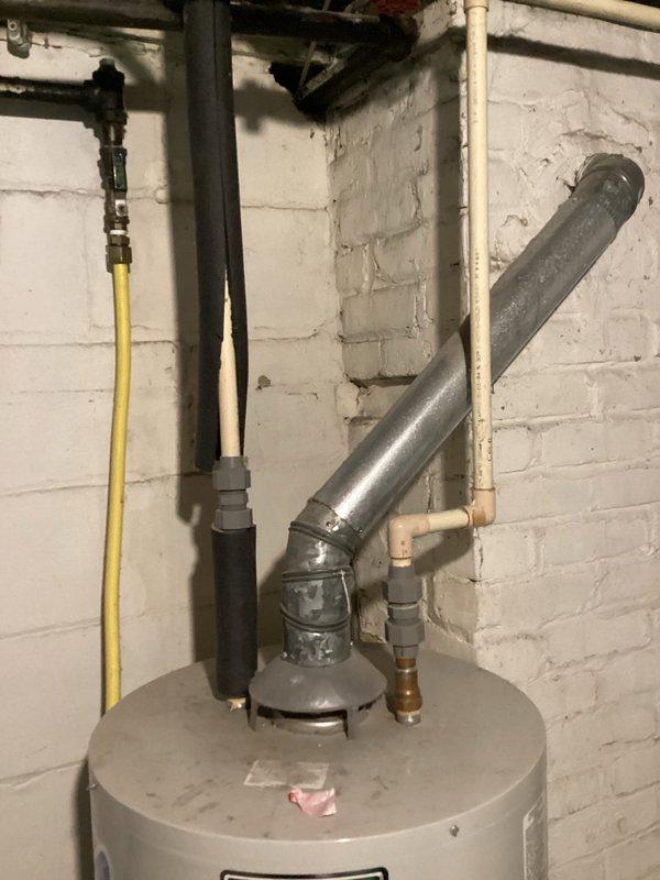 Responded to upstairs bathtub faucet malfunction in 1920s-era single family residence. Upon inspection, identified deteriorated piping section near water meter in basement as root cause of reduced water flow to upstairs bathroom fixture. Replaced compromised pipe segment with new materials, restored proper water pressure and flow to bathtub faucet, and verified system integrity throughout residence.