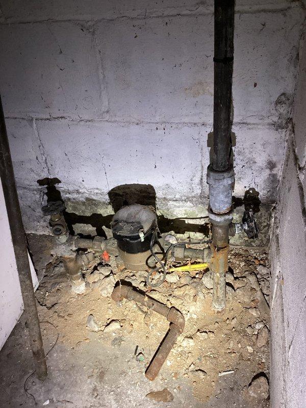 Responded to upstairs bathtub faucet malfunction in 1920s-era single family residence. Upon inspection, identified deteriorated piping section near water meter in basement as root cause of reduced water flow to upstairs bathroom fixture. Replaced compromised pipe segment with new materials, restored proper water pressure and flow to bathtub faucet, and verified system integrity throughout residence.