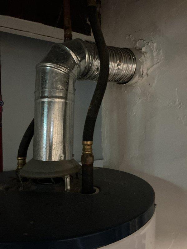 Completed rental inspection of one furnace and one water heater at the property. Performed thorough inspection of furnace unit, accessing internal components to verify proper operation of electrical systems, circuit boards, and mechanical assemblies using diagnostic equipment. Inspected water heater installation, including venting system with flexible corrugated duct and elbow connections to ensure proper exhaust routing and code compliance. Documented equipment conditions and installations with photographs for landlord records.