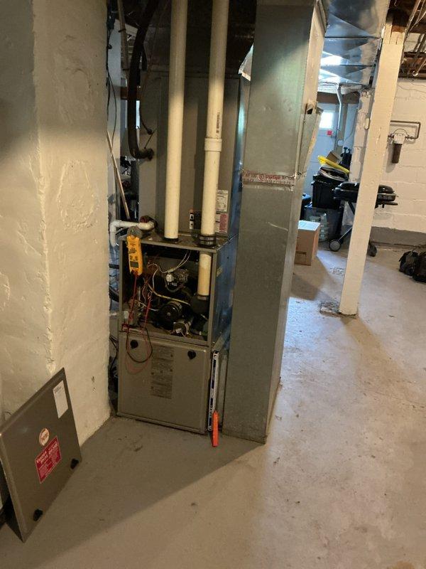 Completed rental inspection of one furnace and one water heater at the property. Performed thorough inspection of furnace unit, accessing internal components to verify proper operation of electrical systems, circuit boards, and mechanical assemblies using diagnostic equipment. Inspected water heater installation, including venting system with flexible corrugated duct and elbow connections to ensure proper exhaust routing and code compliance. Documented equipment conditions and installations with photographs for landlord records.