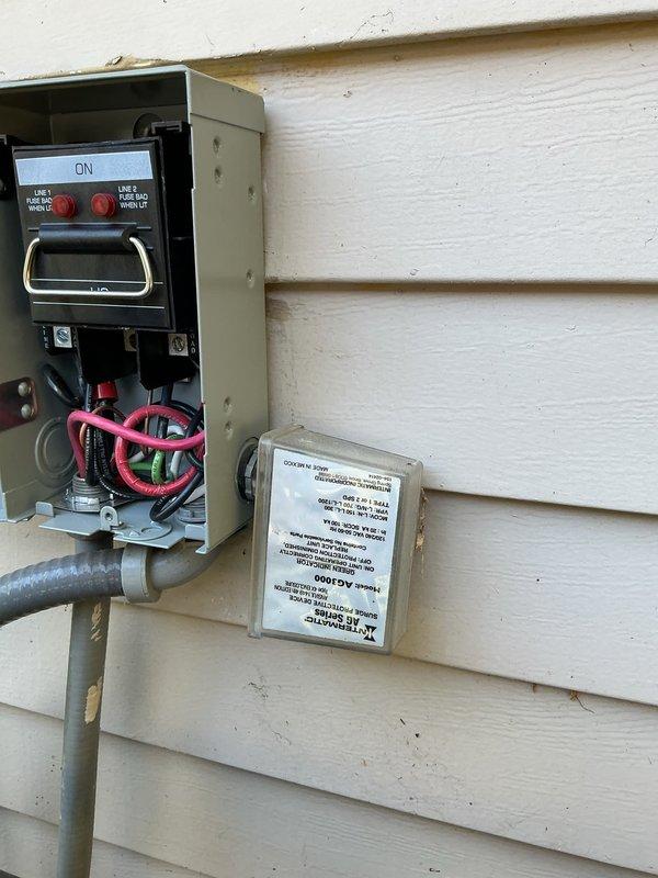 Completed disconnect replacement at residential exterior electrical service point. Removed existing failed disconnect and installed new EATON brand electrical disconnect box with proper conduit connections. Verified proper operation of metering equipment in adjacent Kirby Risk panel, confirmed digital display functionality and all electrical connections secure. All work performed to code with weather-resistant installation on vinyl siding exterior.