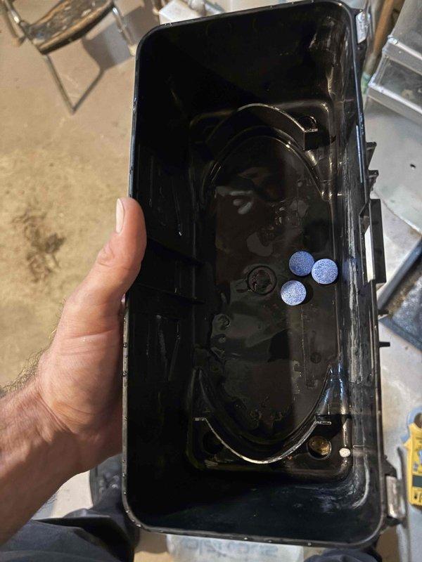 Completed annual cooling maintenance on EnergiAir system under warranty coverage. Inspected and serviced condensate drain pan assembly, which showed moderate accumulation of biological growth and sediment buildup. Cleaned drain pan housing, removed debris, and installed drain pan treatment tablets to prevent future algae formation and maintain proper drainage. System operational and condensate management restored to optimal condition.