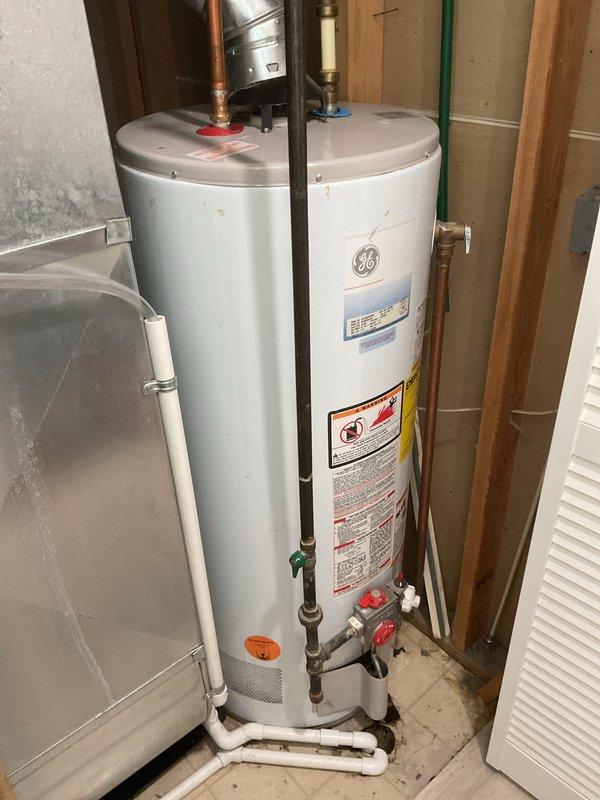 Conducted comprehensive assessment of existing GE water heater installation and associated plumbing systems to provide estimate for recirculation line installation and kitchen water line work. Documented current water heater configuration including copper supply lines, PVC drainage connections, isolation valves, and venting system. Evaluated mechanical room layout, existing plumbing infrastructure, and HVAC ductwork routing to determine optimal pathway for new recirculation line and kitchen water line modifications.