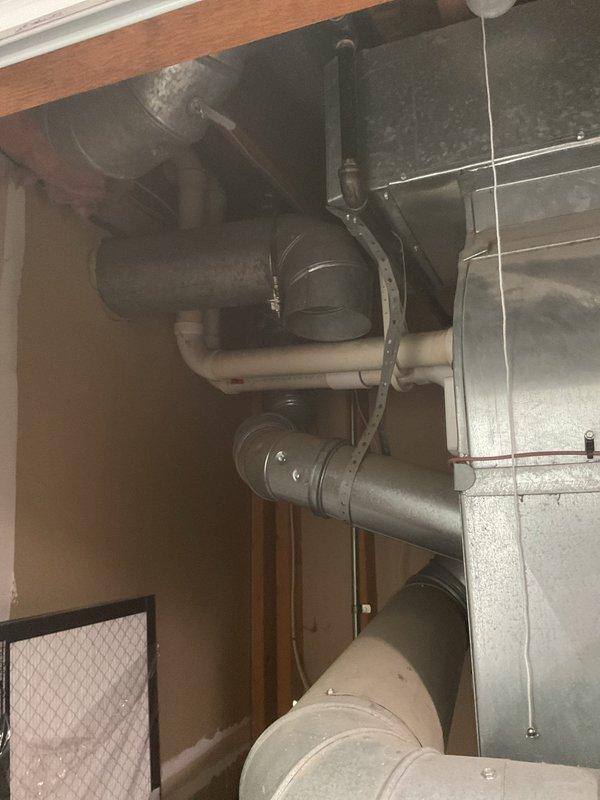 Conducted comprehensive assessment of existing GE water heater installation and associated plumbing systems to provide estimate for recirculation line installation and kitchen water line work. Documented current water heater configuration including copper supply lines, PVC drainage connections, isolation valves, and venting system. Evaluated mechanical room layout, existing plumbing infrastructure, and HVAC ductwork routing to determine optimal pathway for new recirculation line and kitchen water line modifications.